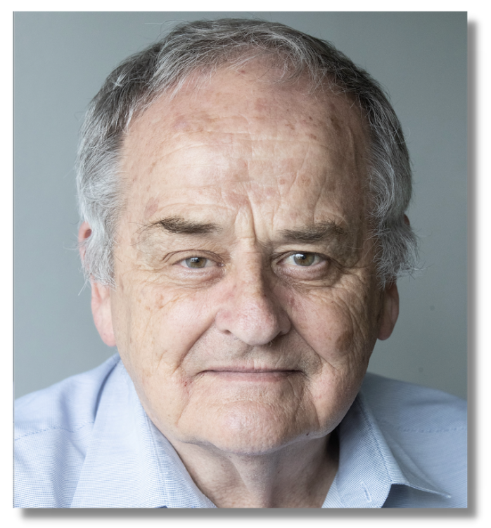 Image of Mike Styles, a man with grey hair in an open-collared blue shirt 