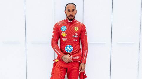 lewis hqmilton in a red ferrari suit
